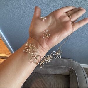 Gold and pearl flower earrings and necklace